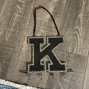 “K” Cheetah hanging necklace holder
